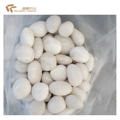 white polished pebbles white polished pebbles